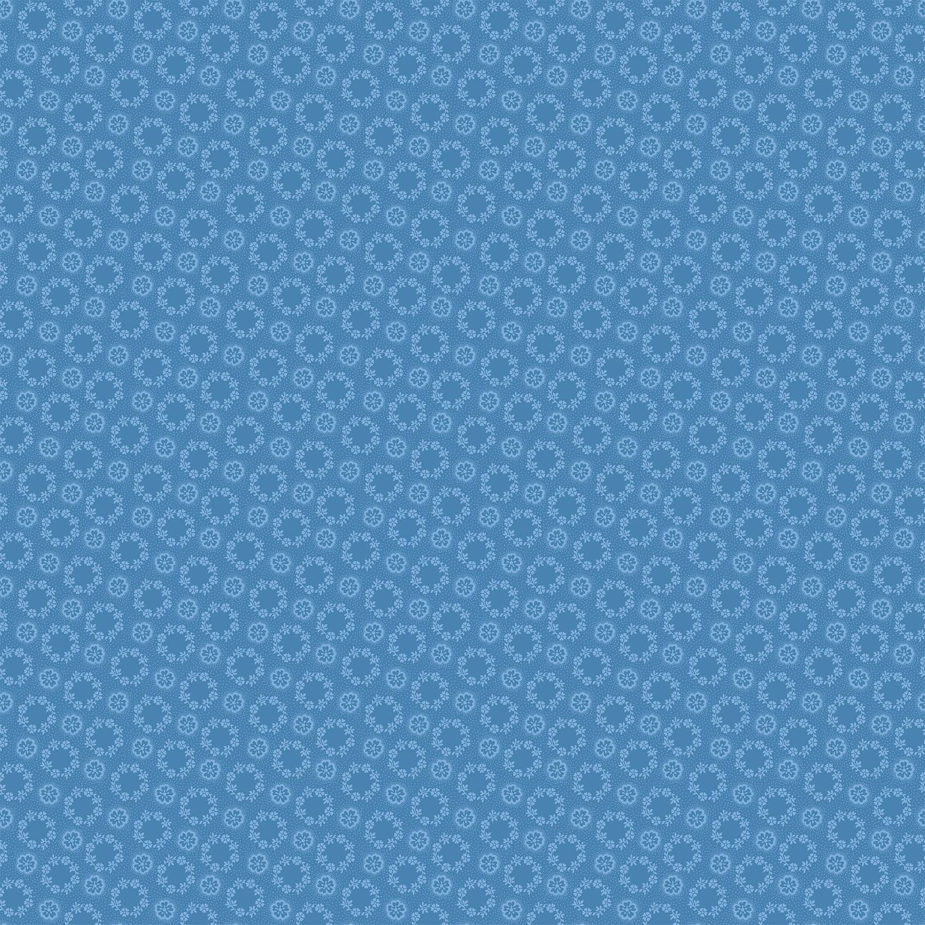 A blue fabric with a traditional geometric pattern.