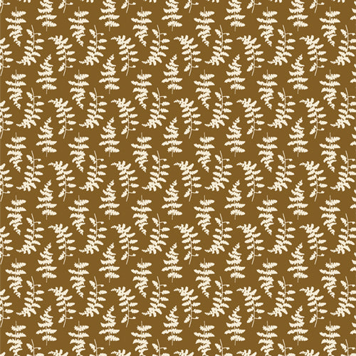 A fabric with a gold colour background and a pattern of white foliage.
